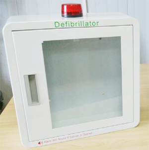 AED cabinet with alarm